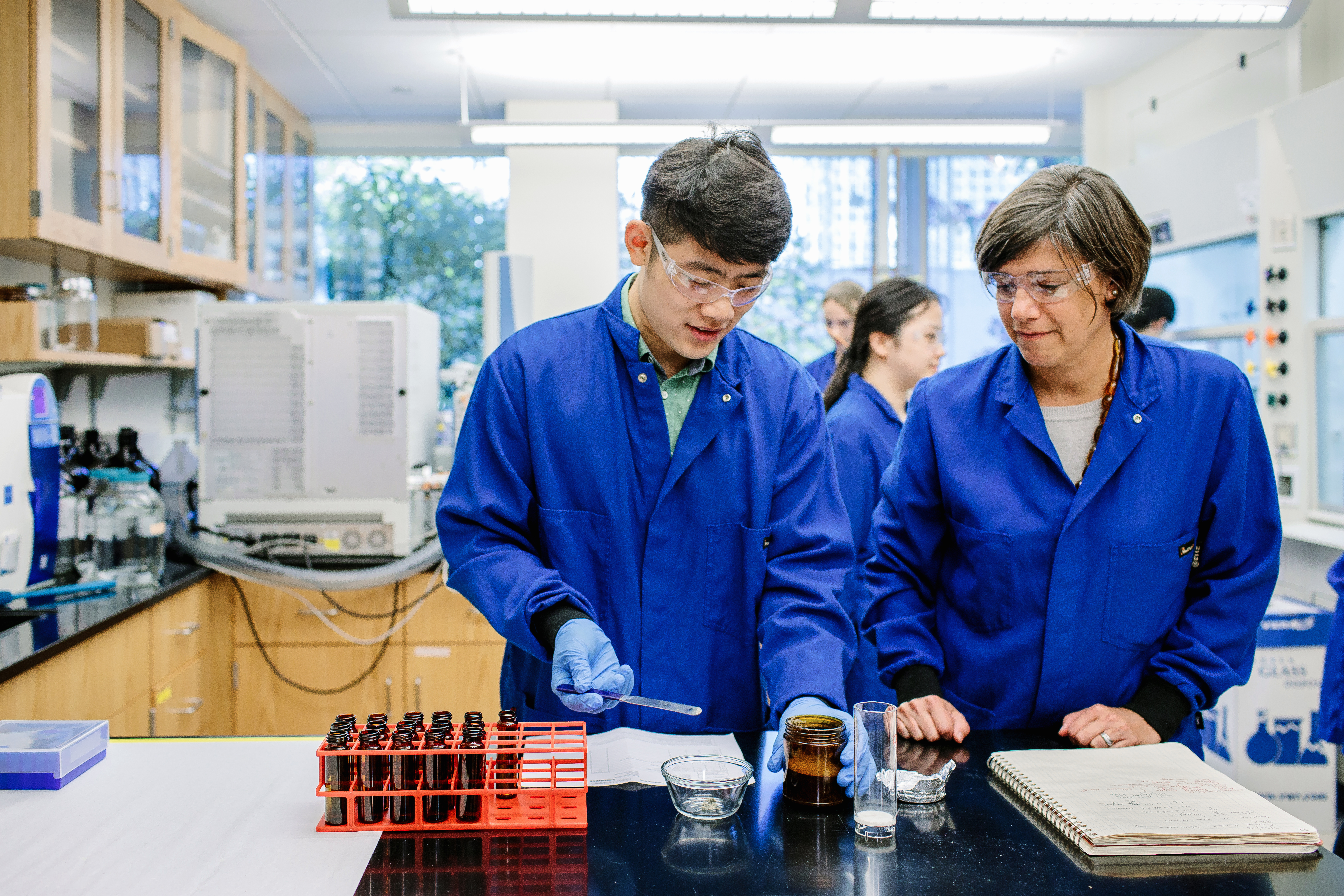 professor and student working in environmental engineering lab