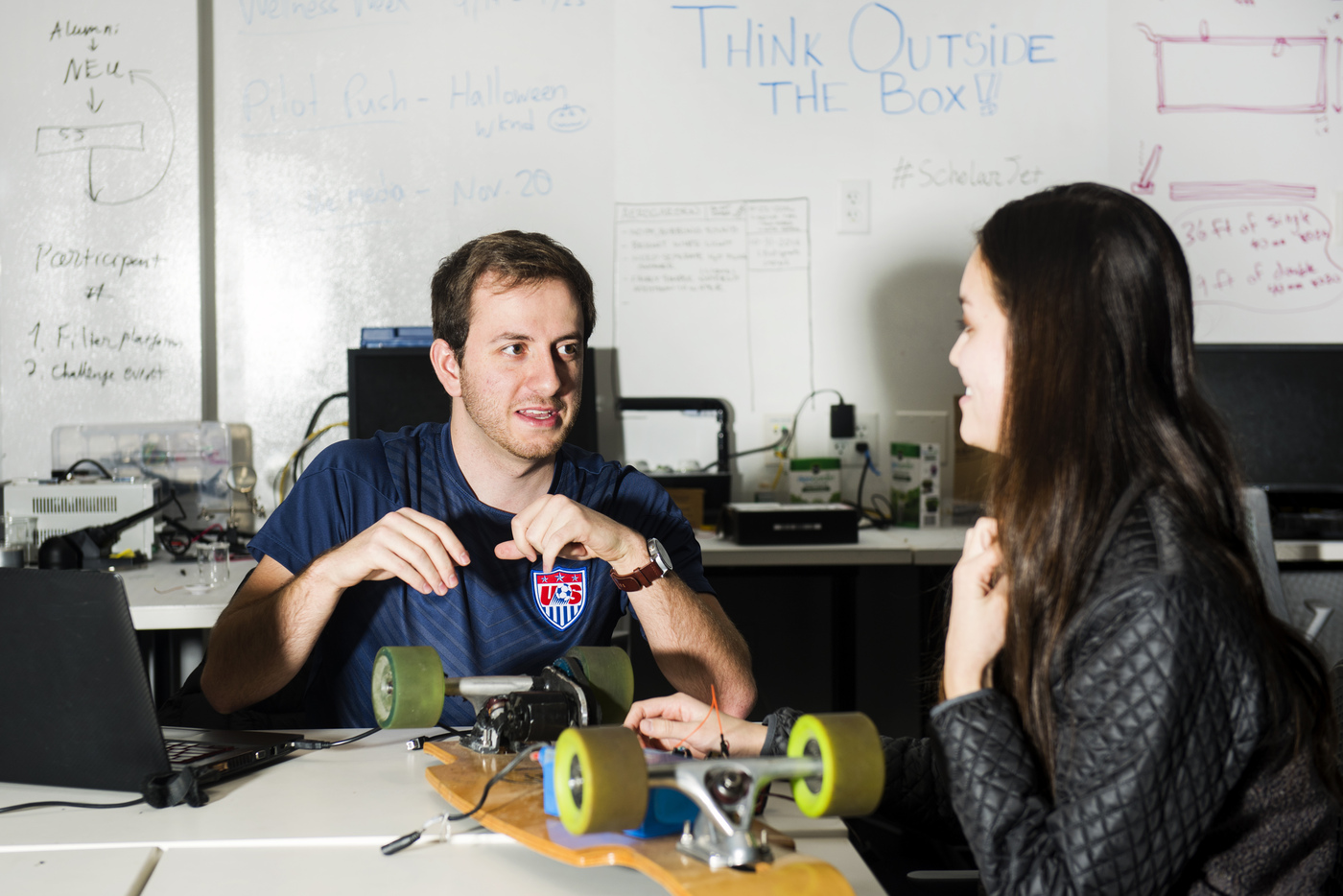 Generate team members Andrew Mello and Mary Morrison both E'18, work on their product for Dash Electric in the Sherman Center on Dec. 14, 2016. Photo by Adam Glanzman/Northeastern University