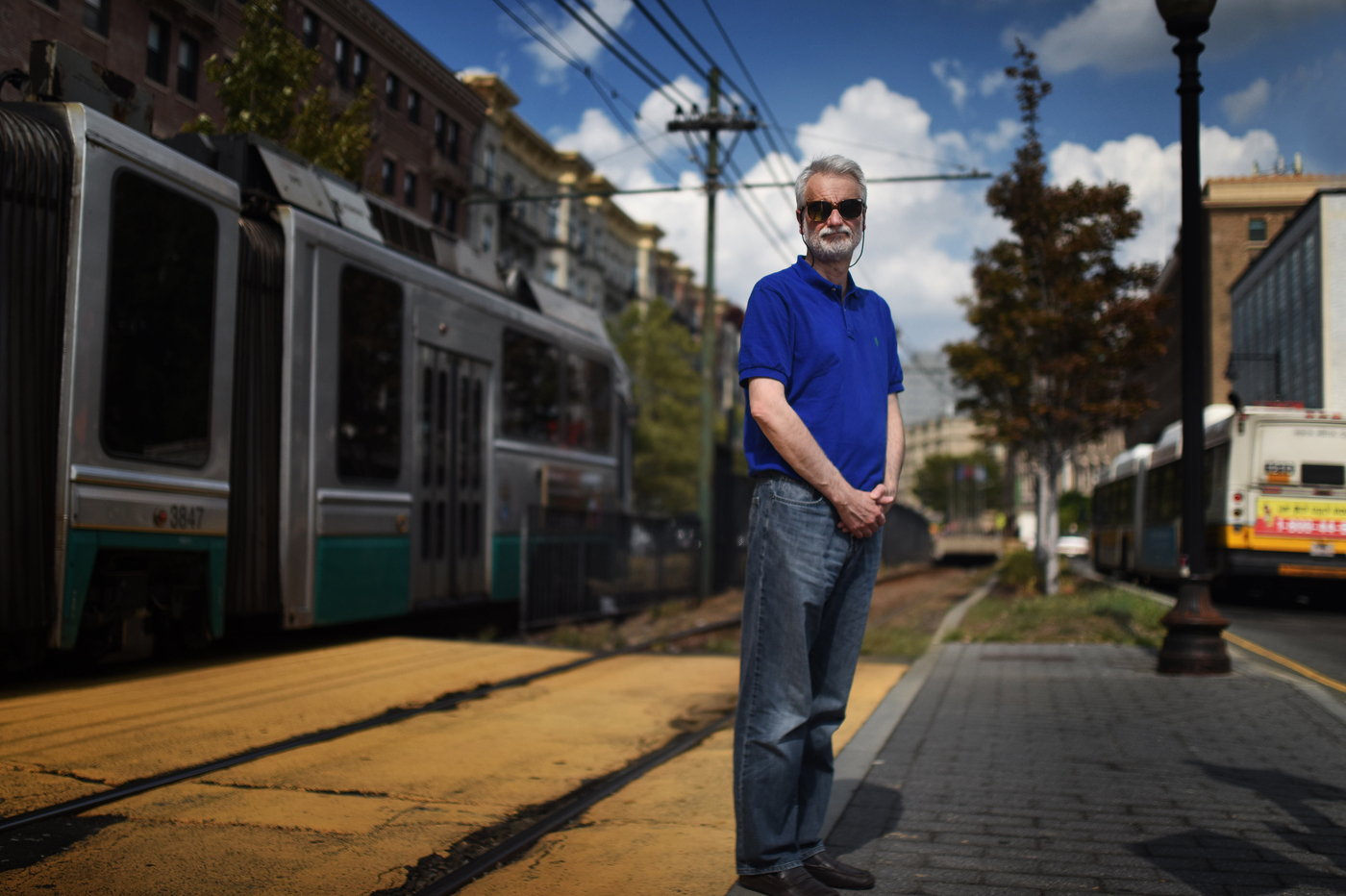 Haris Koutsopoulos, professor of civil and environmental engineering, stands at Northeastern station on the MBTA Green Line. Photo by Matthew Modoono/Northeastern University