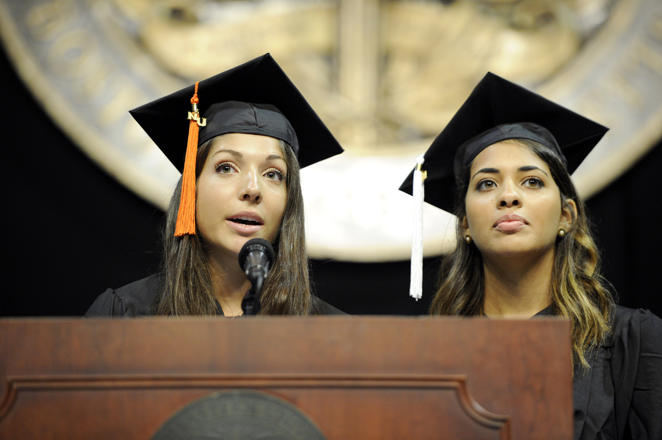 Julieta Moradei, E’16, left, was one of two seniors who spoke to incoming freshmen at the President's Convocation in September. Photo by Matthew Modoono/Northeastern University