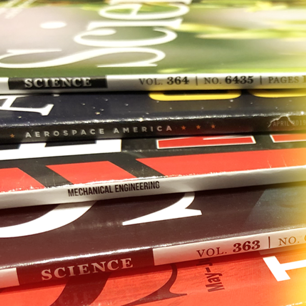 engineering and science magazines in a stack