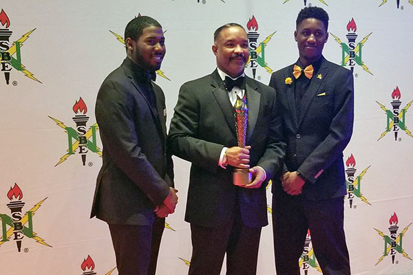 Rich Harris receiving award