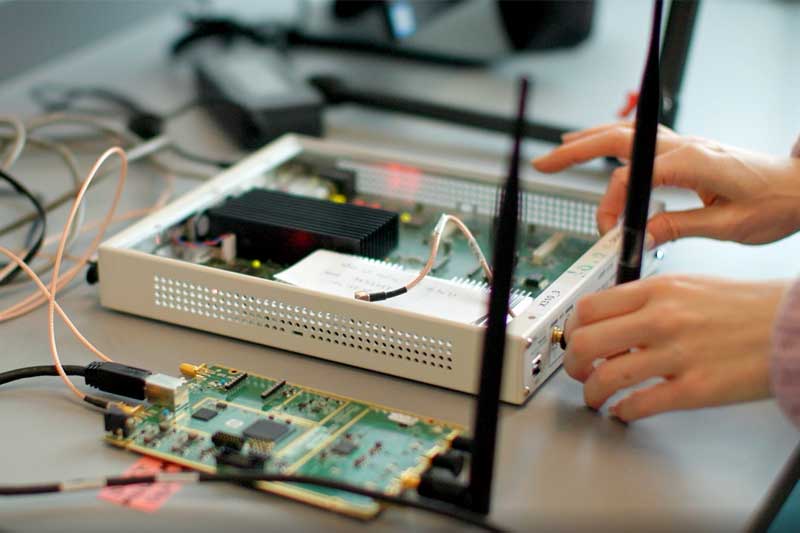 A student works on a circuit board