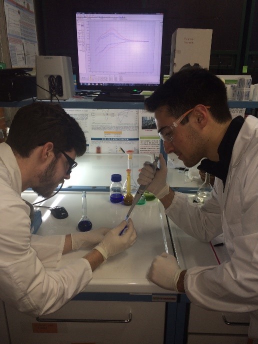 two students working in lab