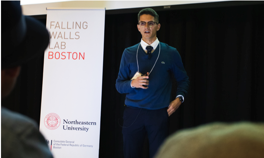 student speaking at falling walls lab boston event