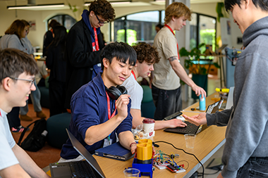 students presenting at the FYE london expo