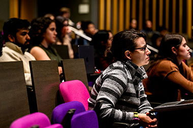 people sitting in a lecture hall