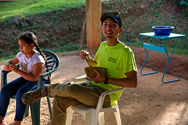 Jose Meza LIamosas sitting outside smiling at the camera