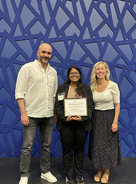 sowdamini ponnada standing with her co-op advisor and WSP manager at the outstanding co-op awards
