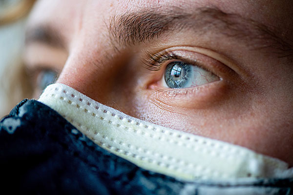 zoomed in view of person with mask on