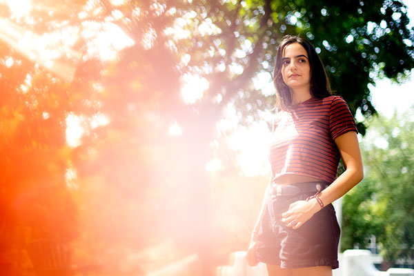 portrait of student outside with dramatic lighting
