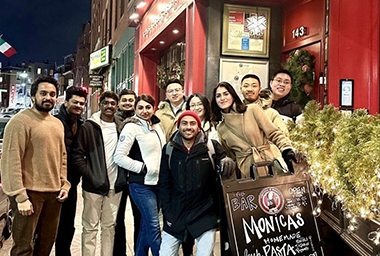 Bishoy Galoaa and the ACLab group photo outside a restaurant