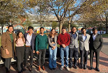 keshab siddhant standing with northeastern students and faculty