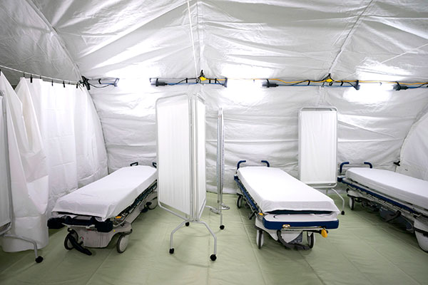 medical tent with three beds