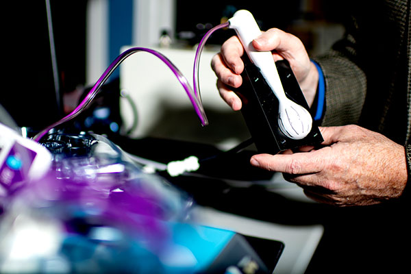 inventor showing one of his patents in action