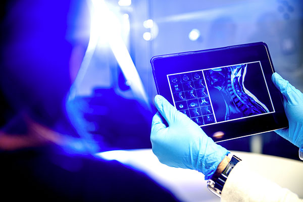 Doctor looking at body scan