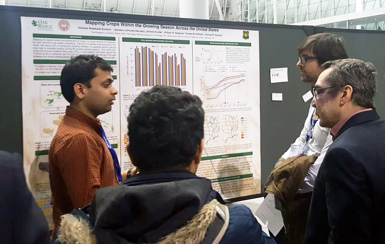 students and faculty at poster symposium